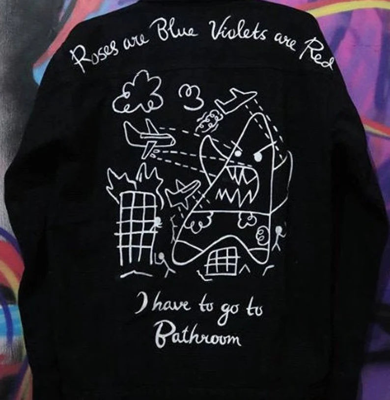 SpongeBob Inspired Punk Black denim jacket with white embroidered designs and text on a colorful background