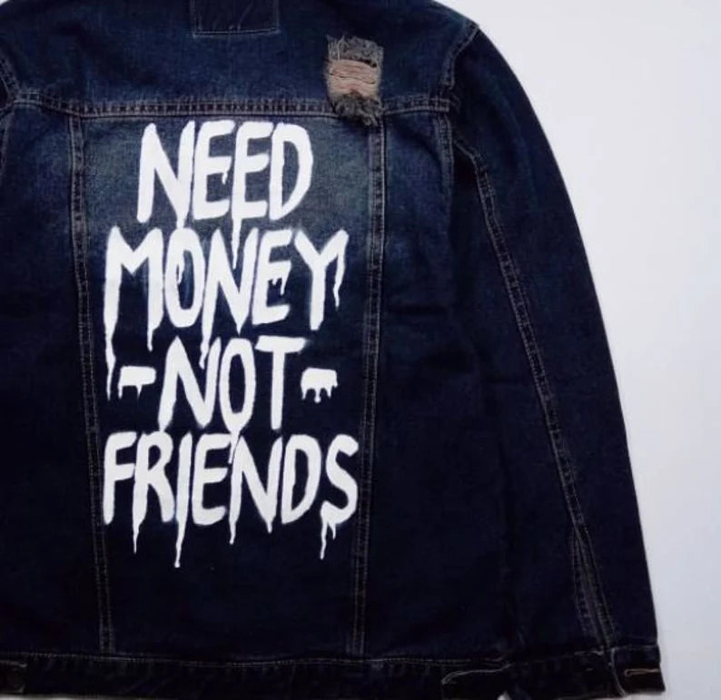 Custom Painted Streetwear Denim jacket with 'NEED MONEY NOT FRIENDS' text on a white background