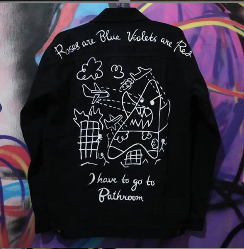 Bikini Bottom Punk Black denim jacket with white graphics and text on a colorful background
