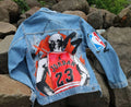 hand painted Denim jacket with a graphic of a basketball player and NBA logo on a rocky background