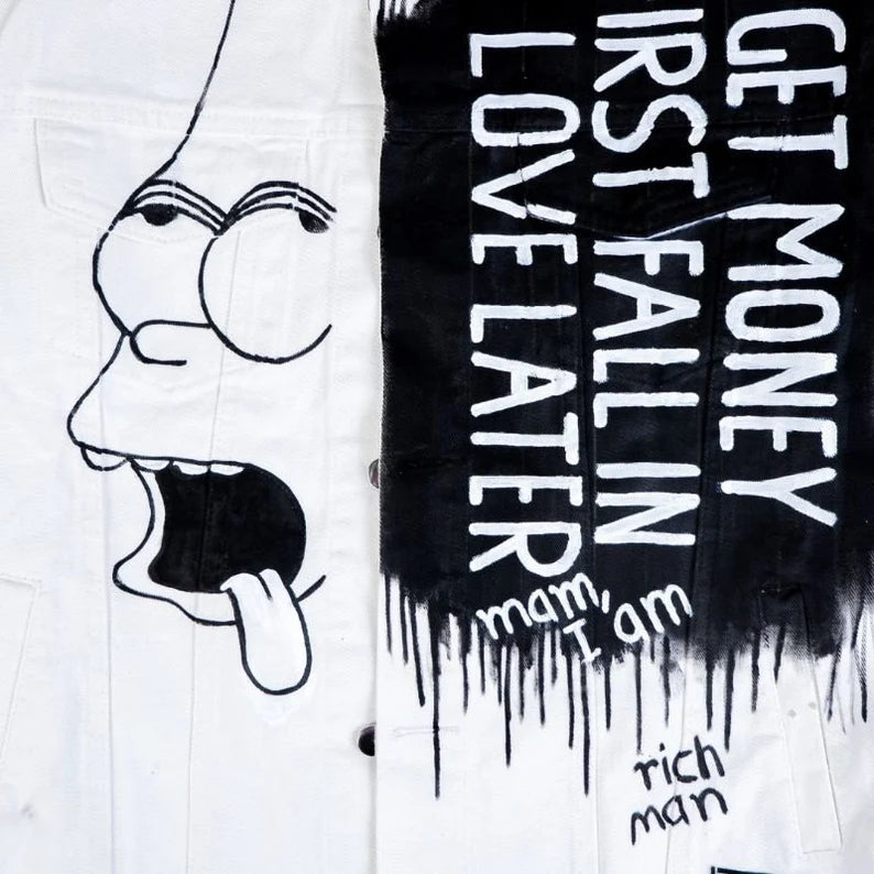 Black and white jacket graphic with text and a face expression on a white background