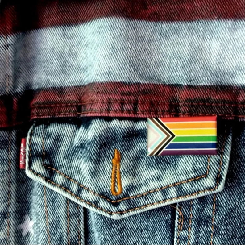 Rainbow flag patch on a denim jacket