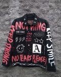 Ultimate Rock Black jacket with red and white text and graphics on a textured gray background