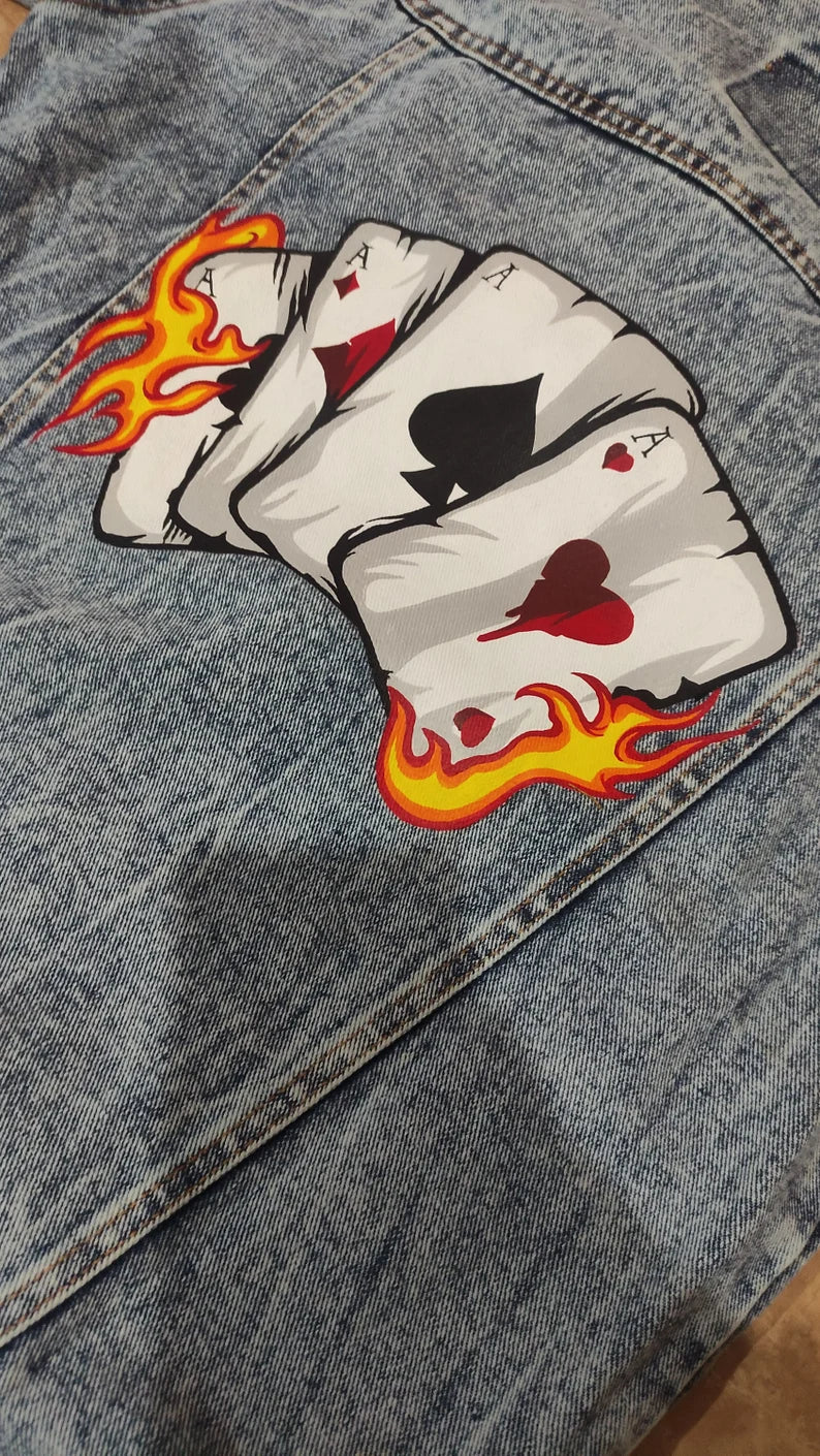 Concert Outfit Ideas Card suit design with flames on denim fabric