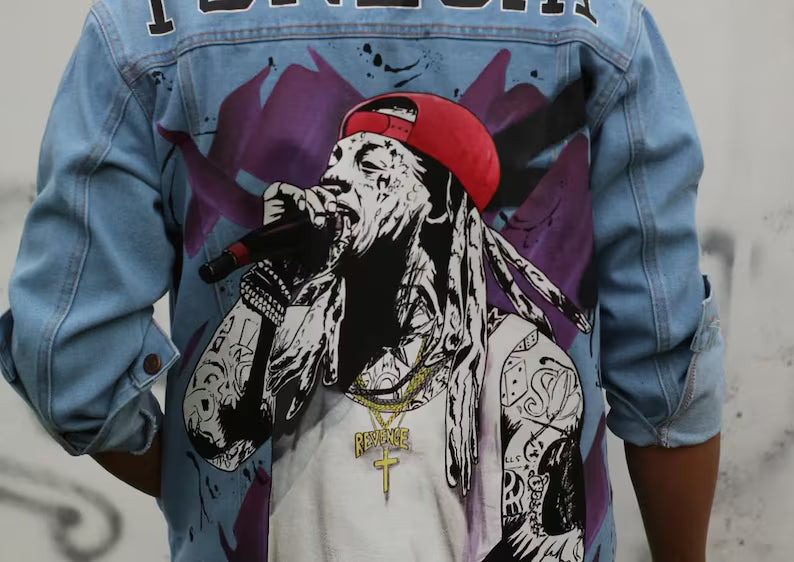 Person wearing a detailed portrait of Lil Wayne Tunechi denim jacket with a graphic design of a person singing into a microphone.