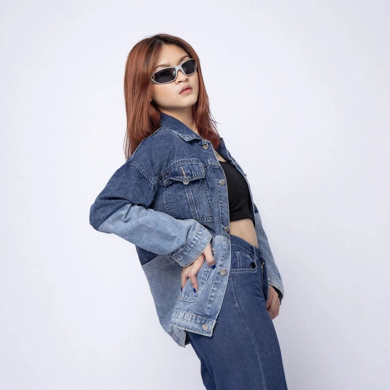 Person wearing a Navy and Blue Fusion Jacket and jeans on a white background