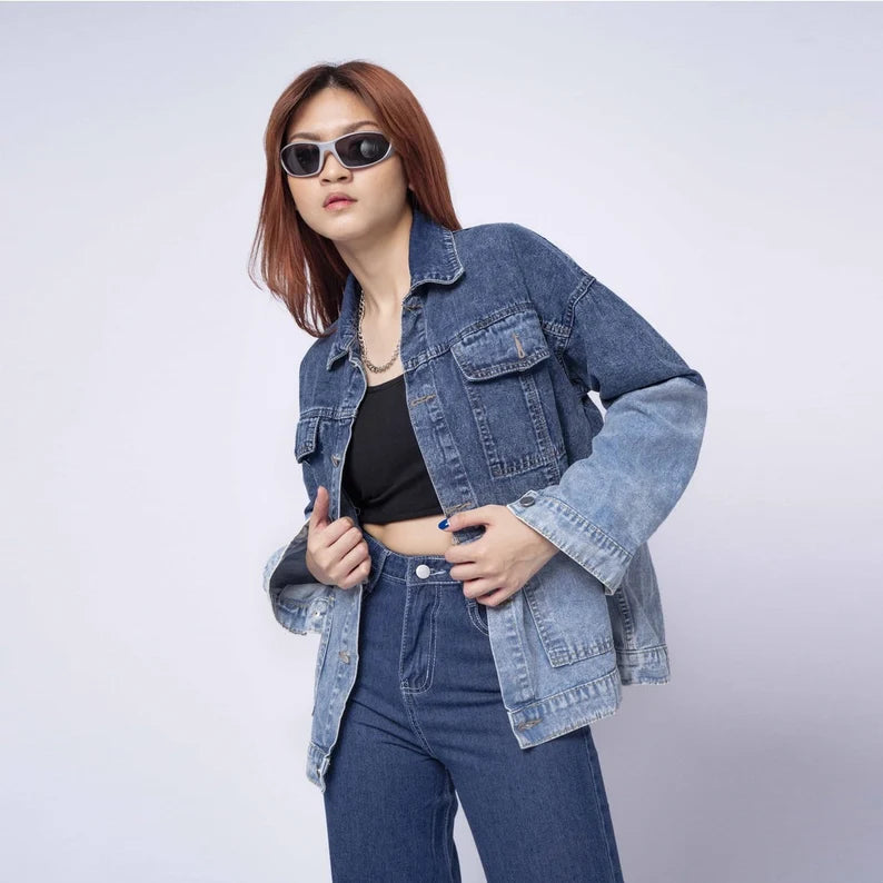 Person wearing a Navy & Blue Two-Tone Jacket and jeans on a plain background
