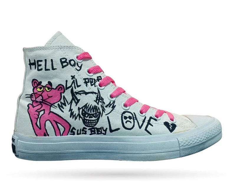 Goth Boi Clique Merch Light blue high-top sneaker with graphic designs and text on a white background