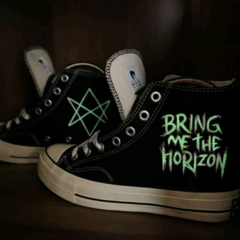 Painted BMTH Black high-top sneakers with 'Bring Me the Horizon' text and logo on a dark background