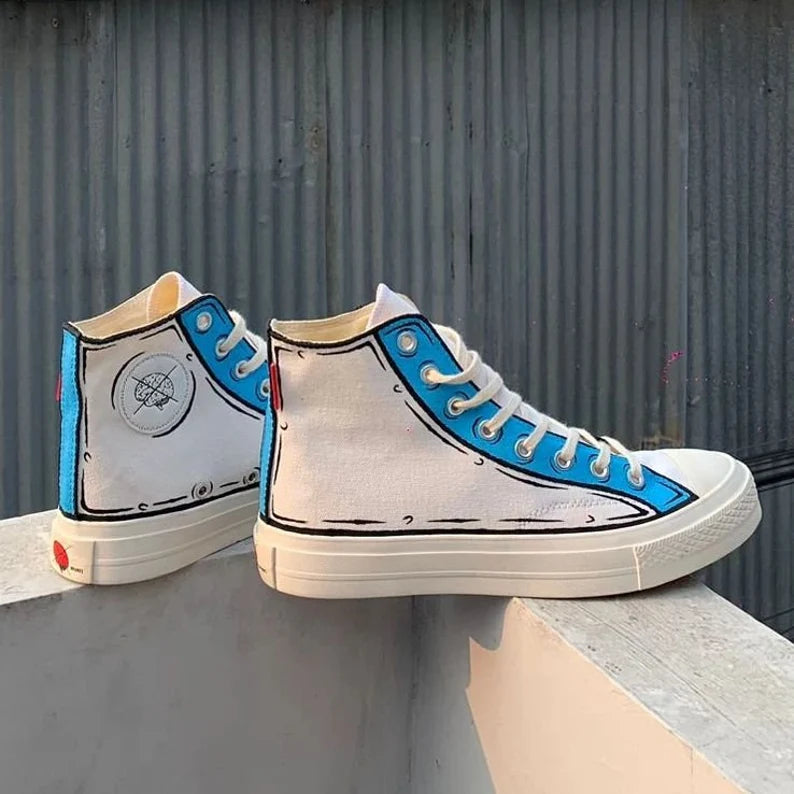 White high-top sneakers with blue accents on a metallic surface cartoon color design