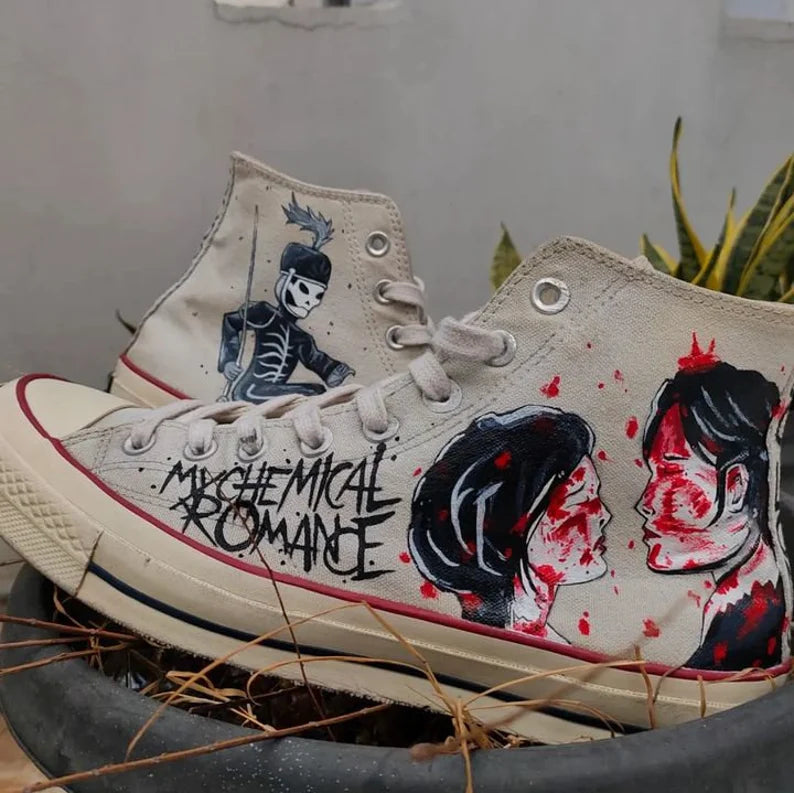 Hand-painted sneakers with artistic mcr The Black Parade designs and text on a neutral background