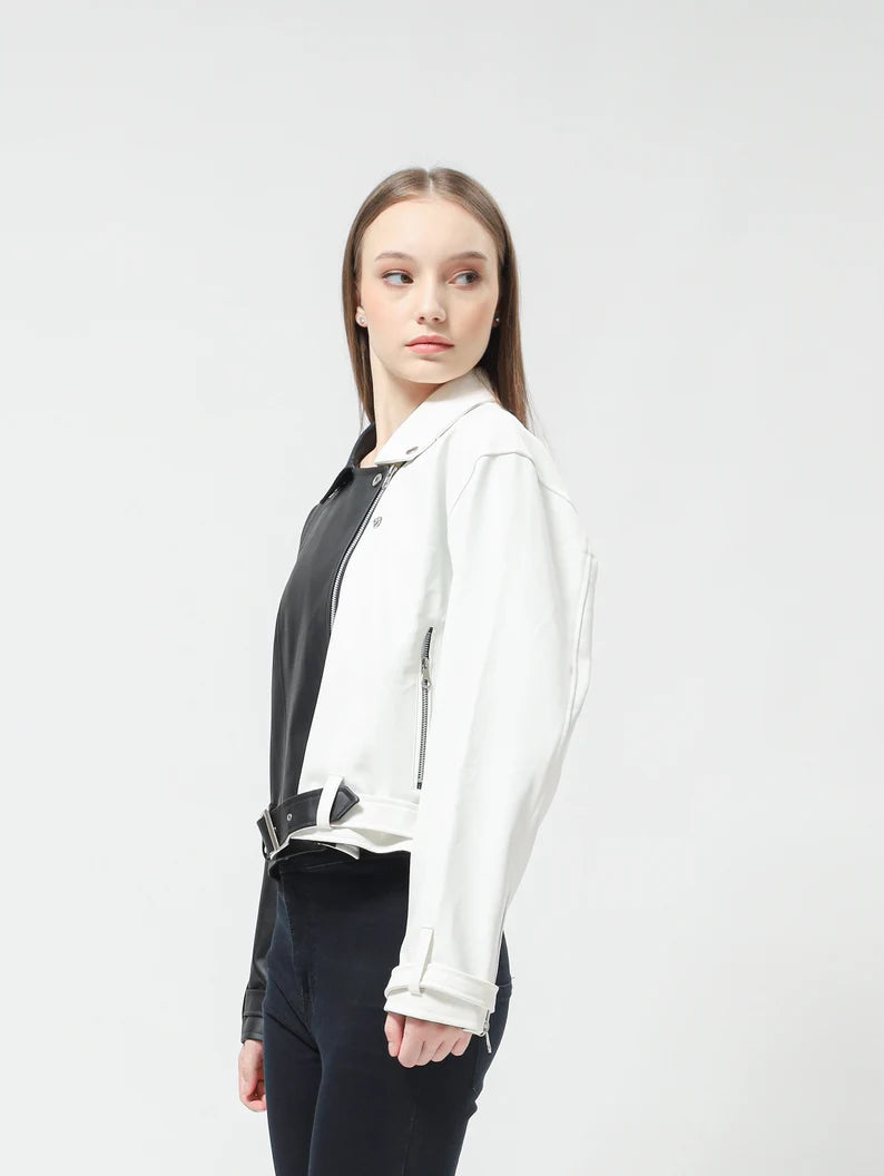 Woman wearing a Two Tone Clothing white jacket over a black shirt on a white background