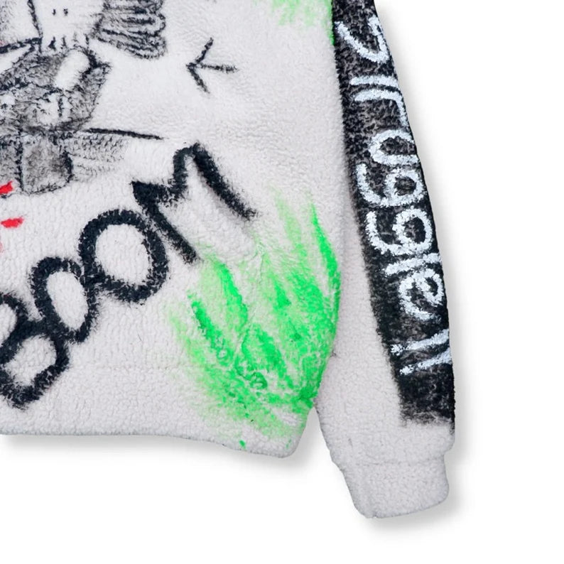 Hand-Painted "Companion" Hoodie Close-up of a white product with black text and green spray paint effect on a white background
