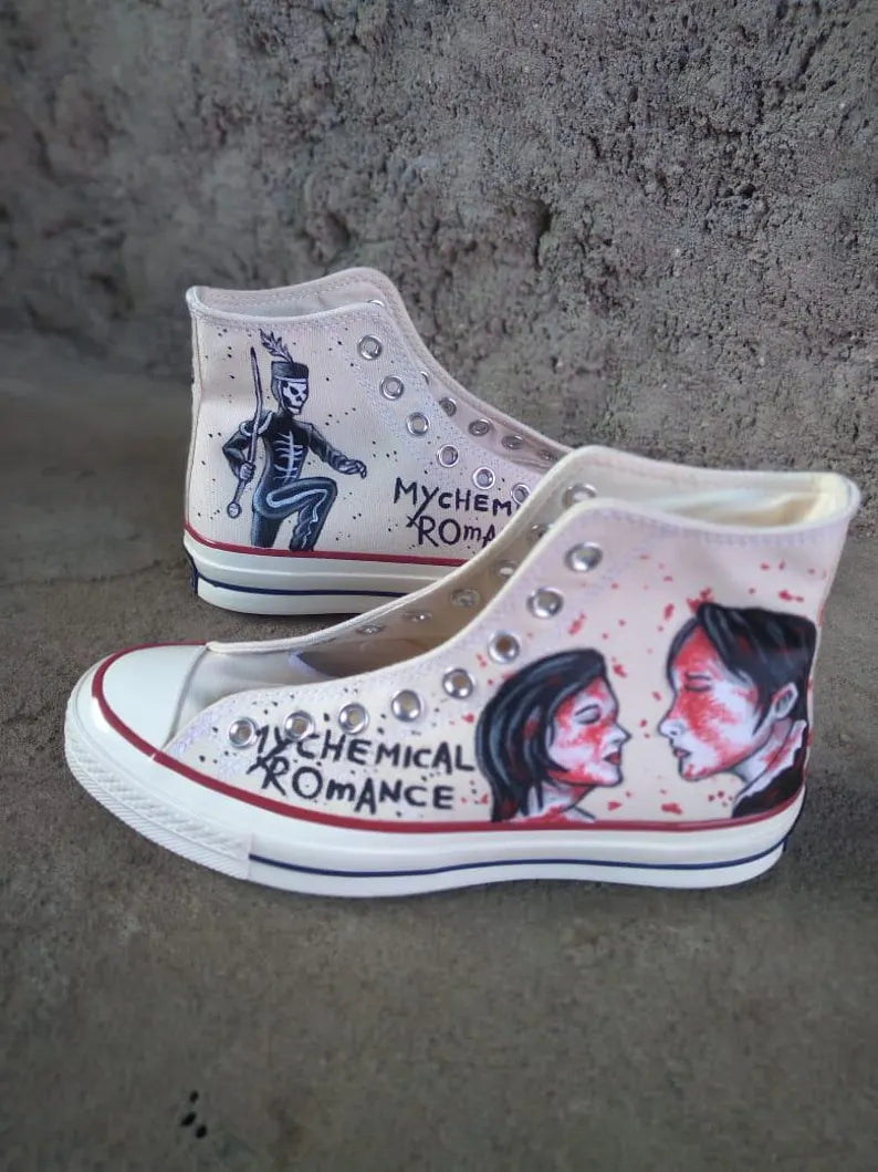 Hand-painted sneakers with 'My Chemical Romance' design on a concrete surface