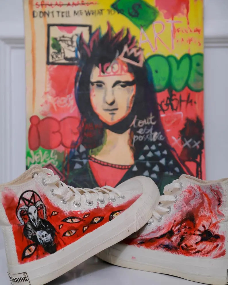 Gothic Halloween Fashion Painted sneakers with artistic design in front of a colorful poster