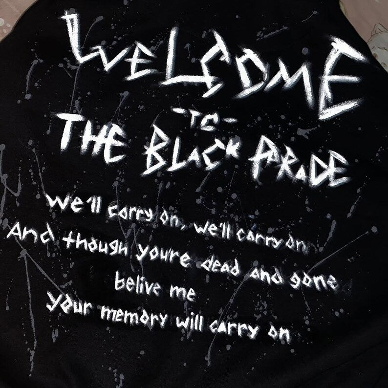 Hand Painted Emo Clothing Text on a black background with white lettering, resembling a song lyric or poem.