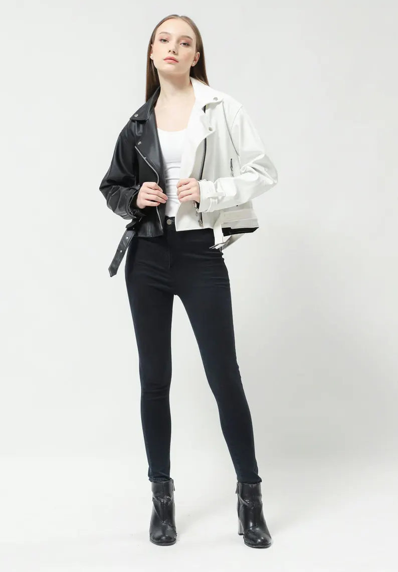 Woman wearing a two-tone black and red hand-painted cropped leather jacket with street art for an edgy outfit